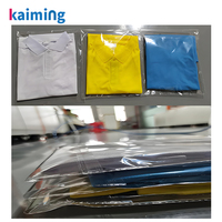 Machine industrielle de pliage de vêtements et d'emballage de t-shirts avec ensachage automatique pour l'habillement