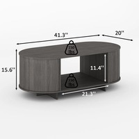 Table basse ovale contemporaine écologique gris mat avec plateau ouvert et étagère, idéale pour appartements et hôtels, MOQ 100 pièces