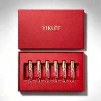 Boîte de présentation de luxe personnalisée en papier, lot de 4, pour flacons de parfum de 5 ml et bouteilles à bille d'huile essentielle