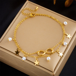 Bracelet de cheville empilable Forever Symbol en acier inoxydable plaqué or avec breloques étoile à cinq branches et perle blanche, délicat pour le quotidien - Product Image 4