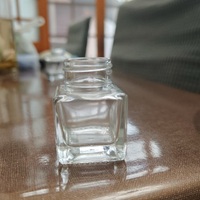 Botol Tinta Kaca Persegi Transparan Bebas Timbal dengan Tutup Sekrup untuk Tinta Pena Basah, Logo Dapat Disesuaikan, Ukuran 25ml 50ml 100ml