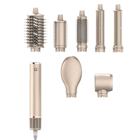 Coffret Cadeau Coiffant 7-en-1 1300W : Brosse Soufflante, Sèche-Cheveux et Fer à Boucler Sans Fil 36mm à Trois Tiges