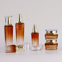 Set Kemasan Perawatan Kulit kaca kosong kustom mewah Set botol Losion Matte selesai Krim Serum Diffuser tutup sekrup cetak layar