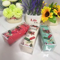 Jouet à presser en caoutchouc souple à récupération lente en forme de bâton de beurre, thème Noël, anti-stress, boîte de 12 pièces, couleurs rouge, menthe, vert, blanc
