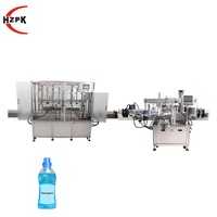Ligne de production HZPK de remplissage automatique de liquides et d'étiquetage double face pour bouteilles en verre et en plastique de shampoing, détergent et sauce
