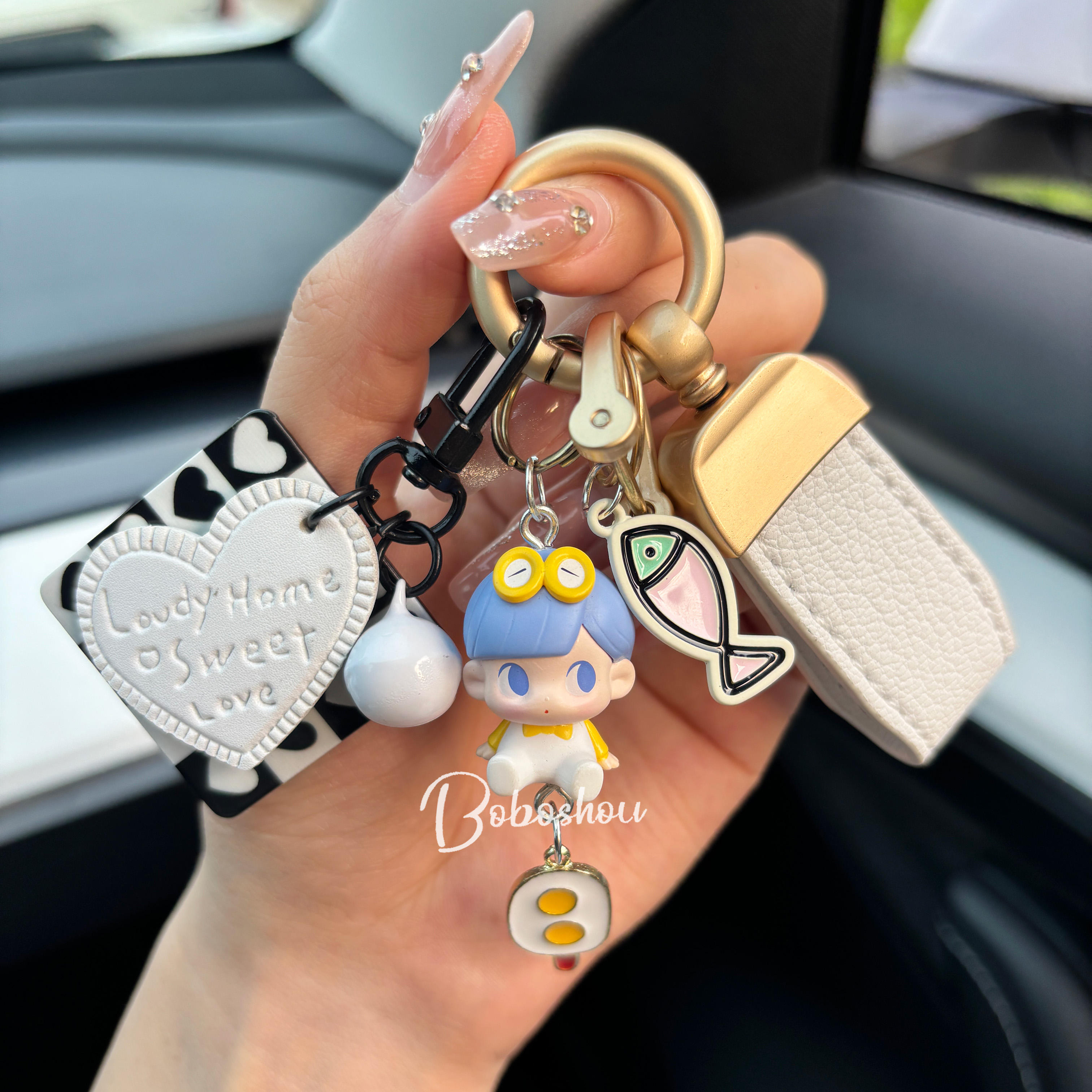 Sitting posture broken shell-day key chain