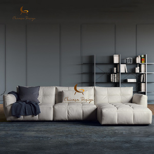 Sofá Seccional de Esquina de Cuero de Estilo Minimalista Italiano, Decoración de Metal, Suave, en Forma de L, para Sala de Estar - Product Image 1