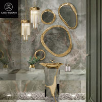 Miroir mural de luxe moderne de forme organique, en laiton martelé doré, miroir décoratif irrégulier en forme de galet pour villa, salon, salle de bain