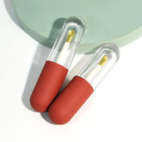Nouveau Tube de brillant à lèvres en forme de capsule de 5ml Applicateur métallique de luxe Brosse à pieds Biche Glaçure à lèvres ronde Bouteille Liptint Base transparente