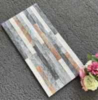 Vente en gros 300x600mm Carreaux de revêtement extérieur modernes Aspect pierre Extérieur 3D grossièrement brique pour la maison Prix bon marché Résistance au feu