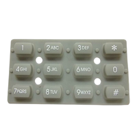 Clavier en silicone flexible personnalisé 3x4 à boutons conducteurs en carbone pour applications d'instruments et de compteurs