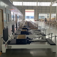 Excellent rapport qualité-prix : Reformer Pilates professionnel en chêne, durable et portable, pour studio de yoga et équipement de fitness commercial.