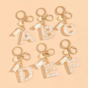 Llavero de Resina con Inicial y Borla, Colgante Decorativo para Bolsos - Product Image 1
