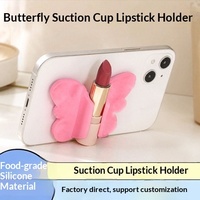 Support de téléphone multifonction en silicone à ventouse style papillon, support de rouge à lèvres anti-choc pour utilisation au lit, pour rouge à lèvres et brillant à lèvres