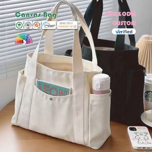 Bolsa Tote de Lona Personalizada com Múltiplos Bolsos Externos, Fechamento com Zíper e Fivela Magnética para Mulheres, Design Grande com Logo - Product Image 1