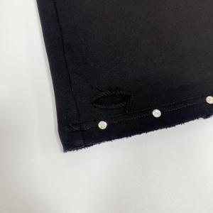 Pantalon de survêtement noir délavé à l'acide, avec logo imprimé DTG personnalisé, déchiré, en molleton français vintage, avec strass - Product Image 5