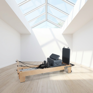 Machine de Pilates Reformer en bois, réglable, durable, pour exercices de renforcement musculaire à domicile, avec barre de repose-pieds, vente en gros, fournisseur chinois - Product Image 1