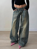 Jean large vintage délavé en denim déchiré avec double bouton et poches plaquées, coupe décontractée ample et décontractée
