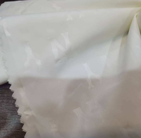 Tissu de doublure en pongé gaufré sergé 100 % polyester antistatique, idéal pour les sacs d'extérieur, les bagages et les vêtements