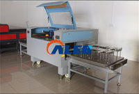 Noix de coco à haute efficacité ouvrant la machine de gravure laser à la noix de coco brune Machine de processus de noix de coco