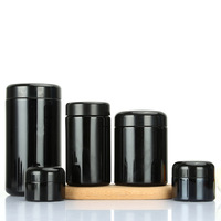 Tarro de cristal cilíndrico negro personalizable al por mayor, esmerilado, de 3.5 gramos, para almacenamiento de flores, 2oz 3oz 4oz, a prueba de olores, a prueba de niños