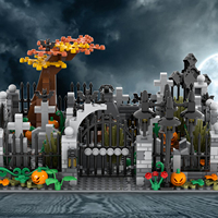 Ensemble de blocs de construction sur le thème de l'Halloween : cimetières, tombes, têtes de citrouille, croix et jouets inclus