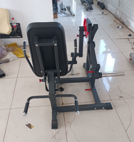 Machine d'extension assise Leg curl Entraîneur multifonctionnel Chaise d'entraînement pour jambes