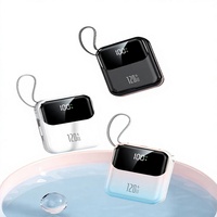 Mini Power Bank promotionnel 20000mAh 22.5W Charge rapide Câbles doubles intégrés Affichage LED Chargeur de voyage portable Design tendance