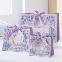 Sacs cadeaux en papier laminé de luxe personnalisés avec logo et poignées pour l'emballage commercial de Noël, vente au détail, shopping