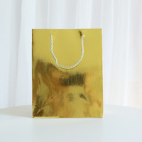 Sacs en papier de luxe en carton or et argent en matériau spécial pour cosmétiques, vêtements, chaussettes, chaussures, emballage, logo personnalisable