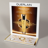 Présentoir de parfum en miroir doré en acrylique Présentoir de bouteille de parfum de comptoir de parfum