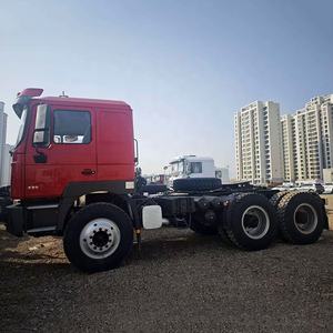 Camion tracteur Shacman 6X4 10 roues 30t de haute qualité à 12 vitesses, à passage de vitesses fluide, diesel robuste avec direction à gauche pour le <span class=keywords><strong>transport</strong></span> <span class=keywords><strong>routier</strong></span> - Product Image 2