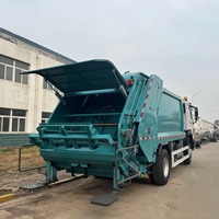Sinotruk HOWO Nx Tx V7 haute qualité 4X2 compacteur à ordures camion Super cuisine gestion des déchets véhicule pompe manuelle moteur