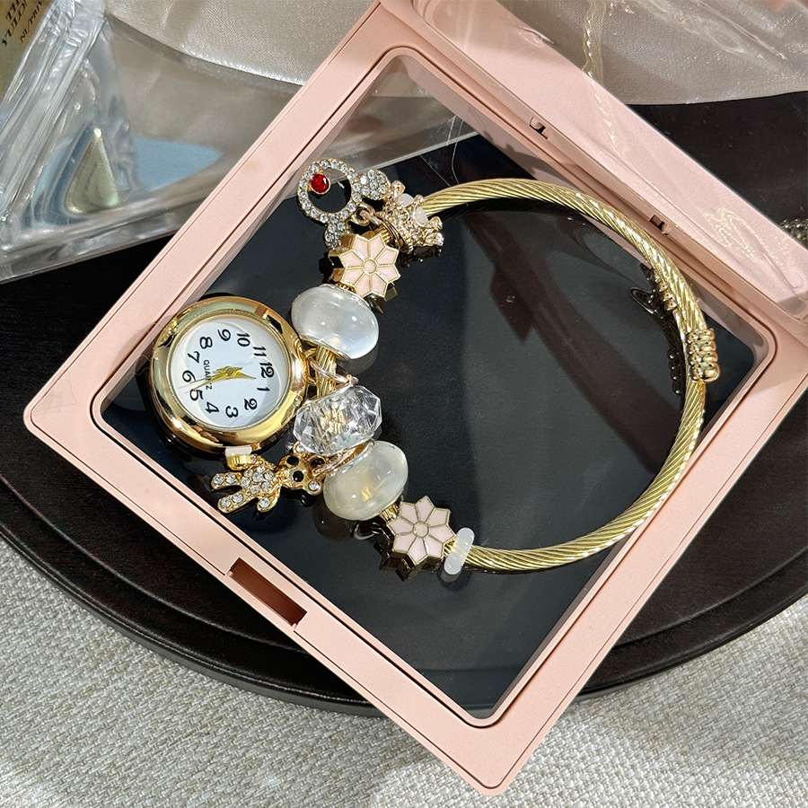 Bracelet rouge transparent doré