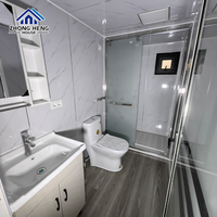 Atelier moderne préfabriqué modulaire extensible avec porte coulissante double à cadre en acier et panneaux ondulés personnalisés et fenêtre transom en verre