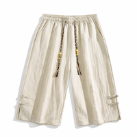 Shorts de surf personnalisés pour hommes, style hip-hop, fabricant OEM ODM, toile noire respirante, fermeture à cordon, cordon décoratif vintage