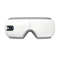 Masseur oculaire électrique blanc en PU, pliable à 180°, avec chauffage intelligent, vibrations et musique, rechargeable 1200 mAh