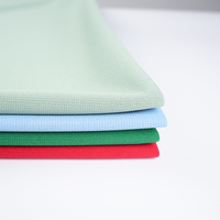 Tela de poliéster similar al algodón elástico ligero Diseño mágico multicolor 100% Jersey elástico de poliéster para ropa