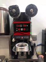 Machine de scellage de chaleur de tasse de boisson automatique électrique commerciale pour l'emballage de Film liquide de yaourt de café de thé de bulle