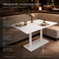 Table de restaurant, plateau en pierre frittée avec base à double colonne blanche et design de table aux coins arrondis pour hôtel et café