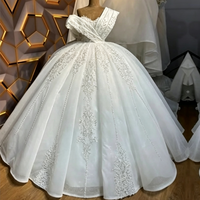 Robe de mariée de luxe élégante 2026 en dentelle perlée, coupe princesse, épaules dénudées, asymétrique, col en V, scintillante, pour mariées africaines