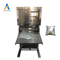 Machine de remplissage automatique de sacs aseptiques en boîte pour vin, jus, eau, huile, lait, eau liquide