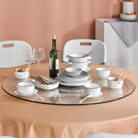 Grande table à manger pliable d'extérieur au design moderne avec combinaison de chaises à plateau tournant Design simple pour le salon à usage domestique
