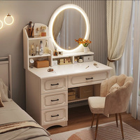 Coiffeuse moderne avec miroir éclairé et tabouret, table de maquillage avec tiroirs et rangements pour chambre à coucher, meuble