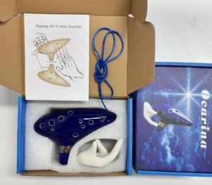 <span class=keywords><strong>Ocarina</strong></span> <span class=keywords><strong>de</strong></span> Cerámica <span class=keywords><strong>de</strong></span> 12 Orificios <span class=keywords><strong>de</strong></span> The Legend of <span class=keywords><strong>Zelda</strong></span> al por Mayor para Principiantes con Libro <span class=keywords><strong>de</strong></span> Canciones y Soporte <span class=keywords><strong>de</strong></span> Exhibición - Product Image 3