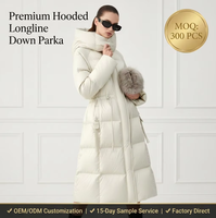 2026 Veste matelassée longue pour femme, personnalisée OEM ODM, réversible, imperméable, coupe-vent, à paillettes, à capuche, au-dessus du genou, en nylon, pour l'hiver, tendance