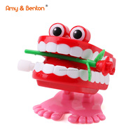 Jouets à remonter amusants Jouets à marcher Dents à claquer avec rose pour les cadeaux de fête