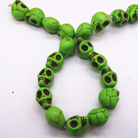 Vente en gros de perles turquoise naturelles sculptées en forme de tête de fantôme, perles focales pour la fabrication de bracelets et de colliers