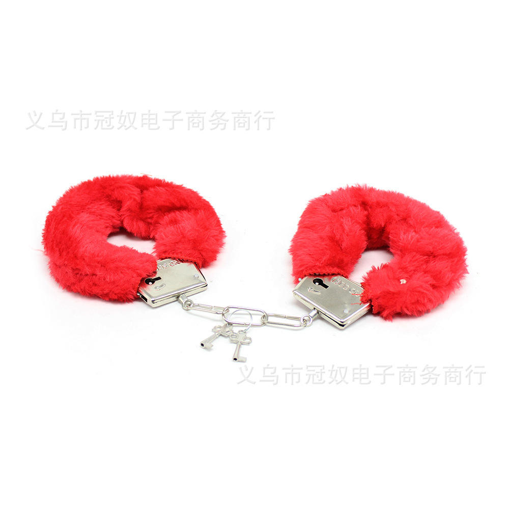 Red plush realistic hand cuffs