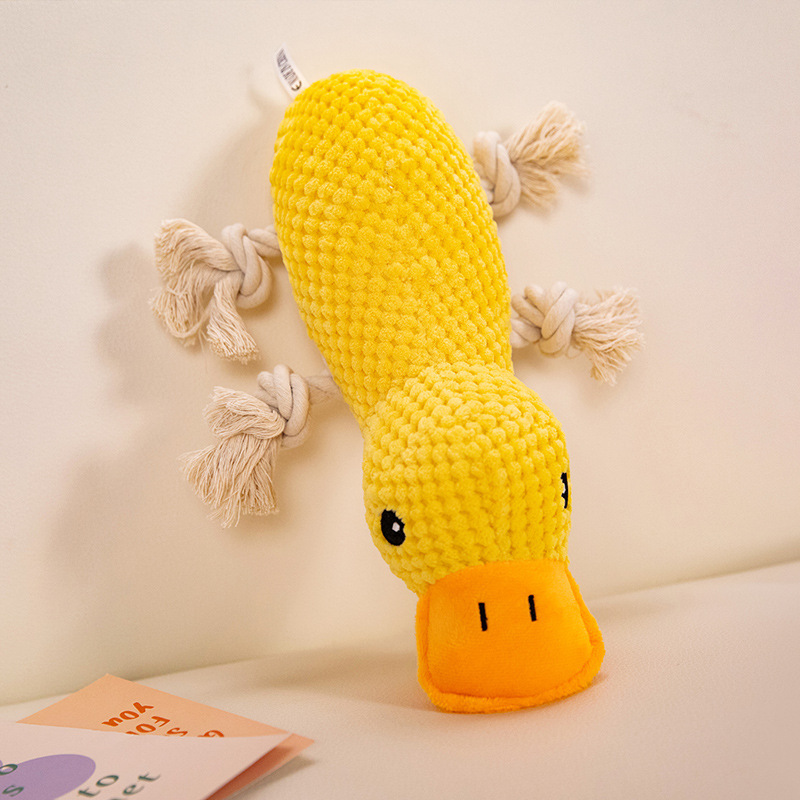 Jouet pour animaux de compagnie en forme de canard couché avec nœud de corde blanche et son couinant.
